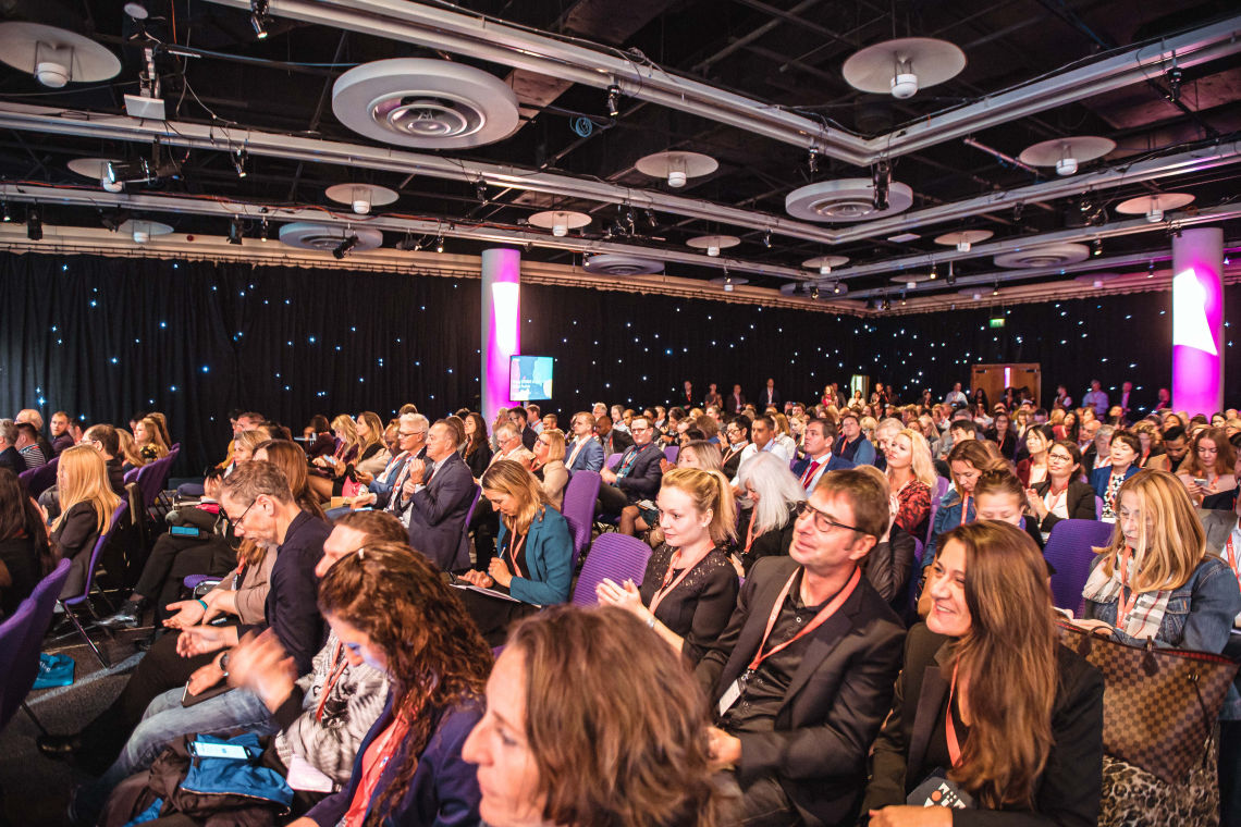 ESOMAR attendees listening intently at a presentation
